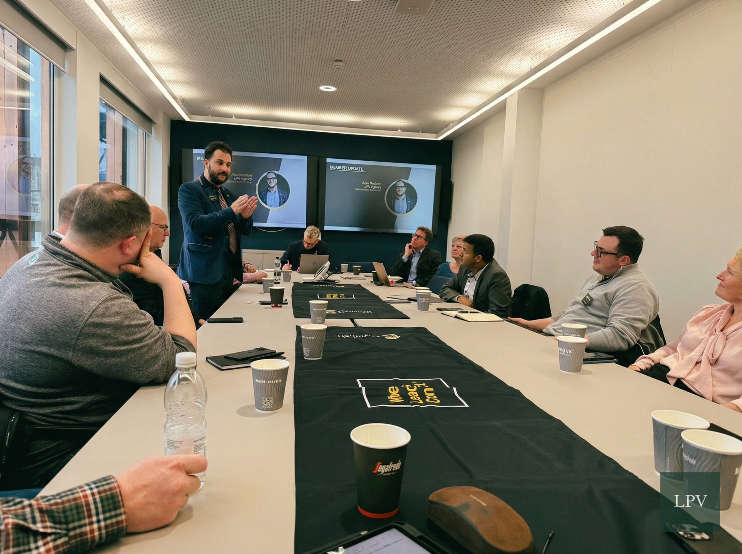 Attendees networking at Corporate Connections London, celebrating design, movies, and 80s culture.