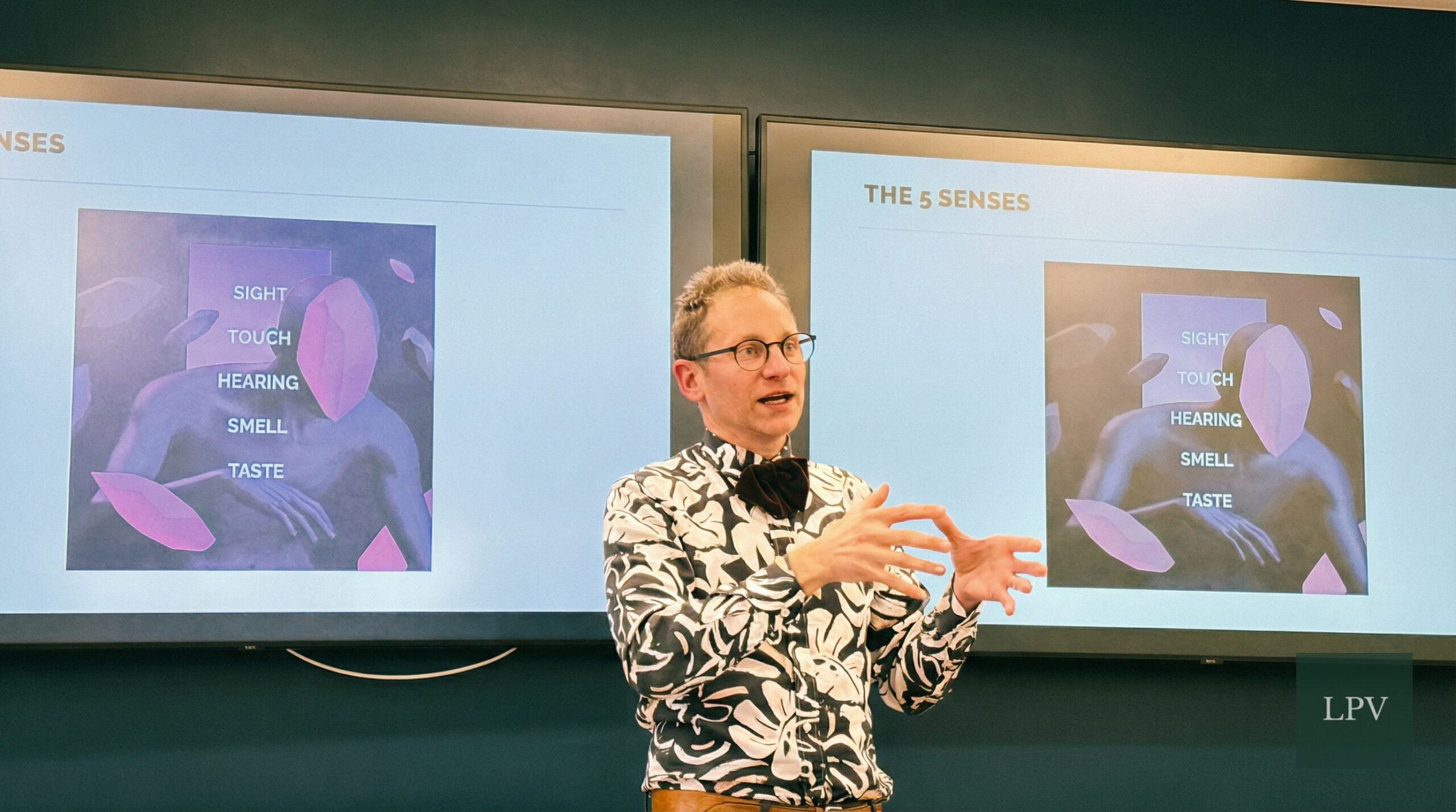 Attendees networking at Corporate Connections London, celebrating design and 80s movie culture.