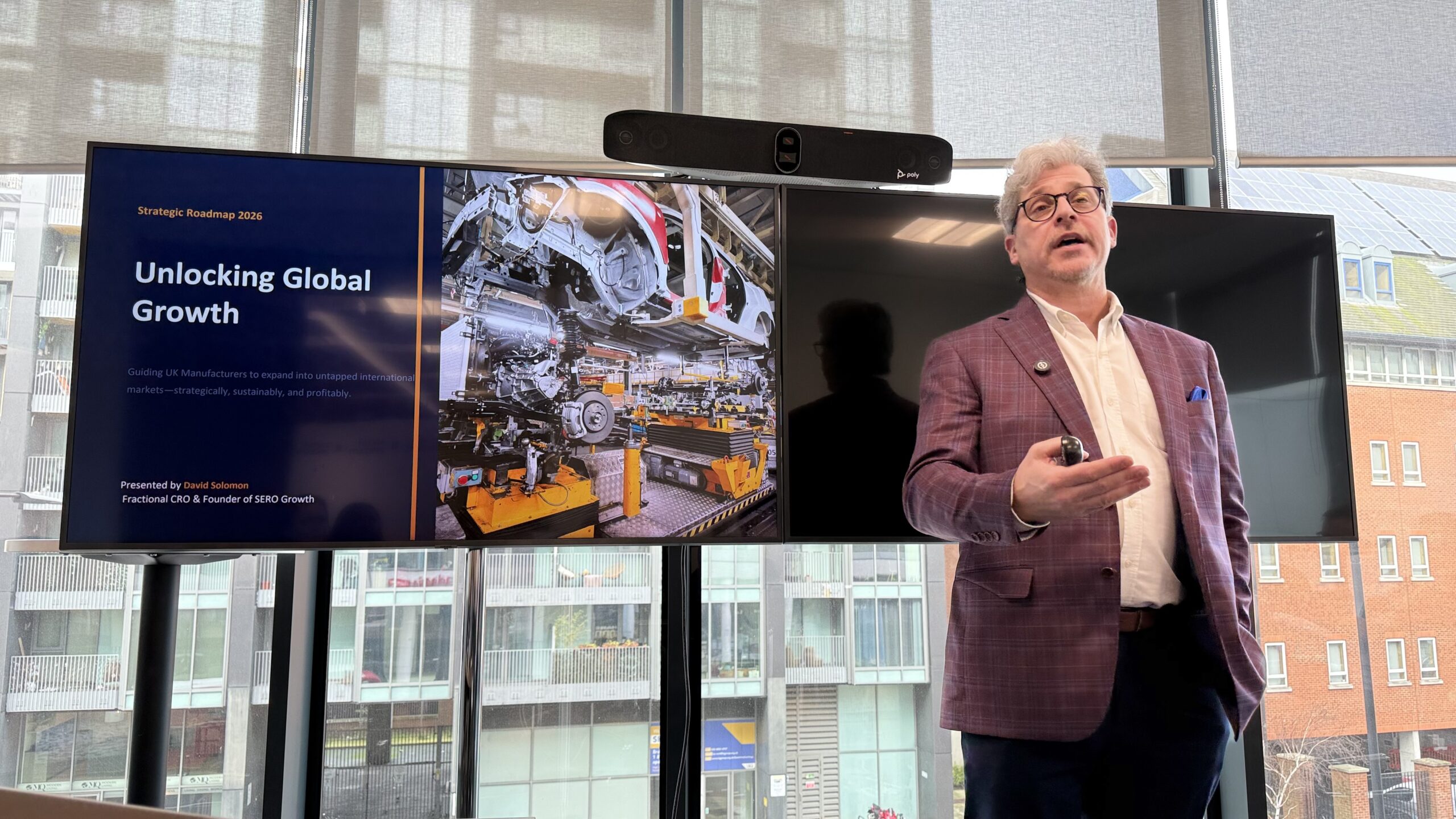 David Solomon presenting growth strategies at the 'Build a Stronger Business' event.