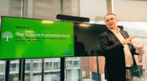 Michael Stewart presenting on building high-performance teams and corporate culture insights.