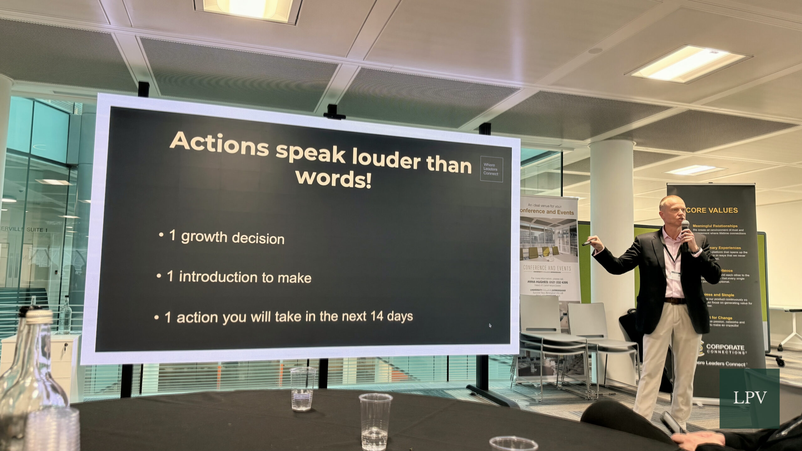 Pete Higgs speaking at the Corporate Connections Scale Summit, sharing valuable insights on relationships.