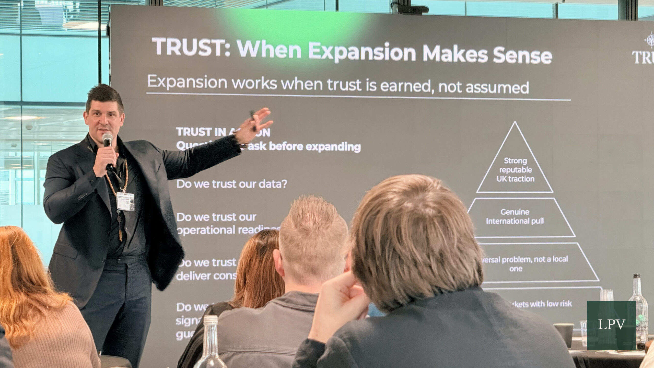 Tom Camilleri presenting at the Corporate Connections Scale Summit on international business expansion.