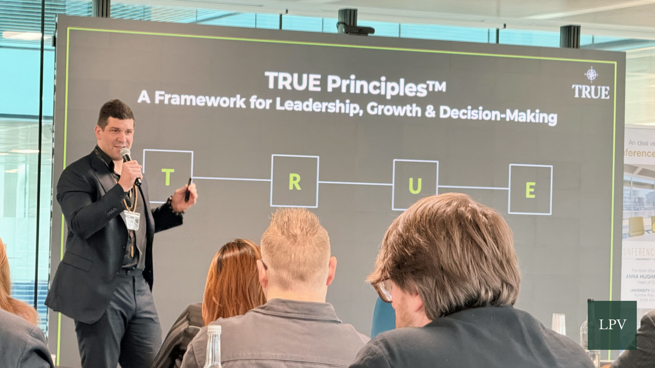 Tom Camilleri presenting at the Corporate Connections Scale Summit on international business expansion.