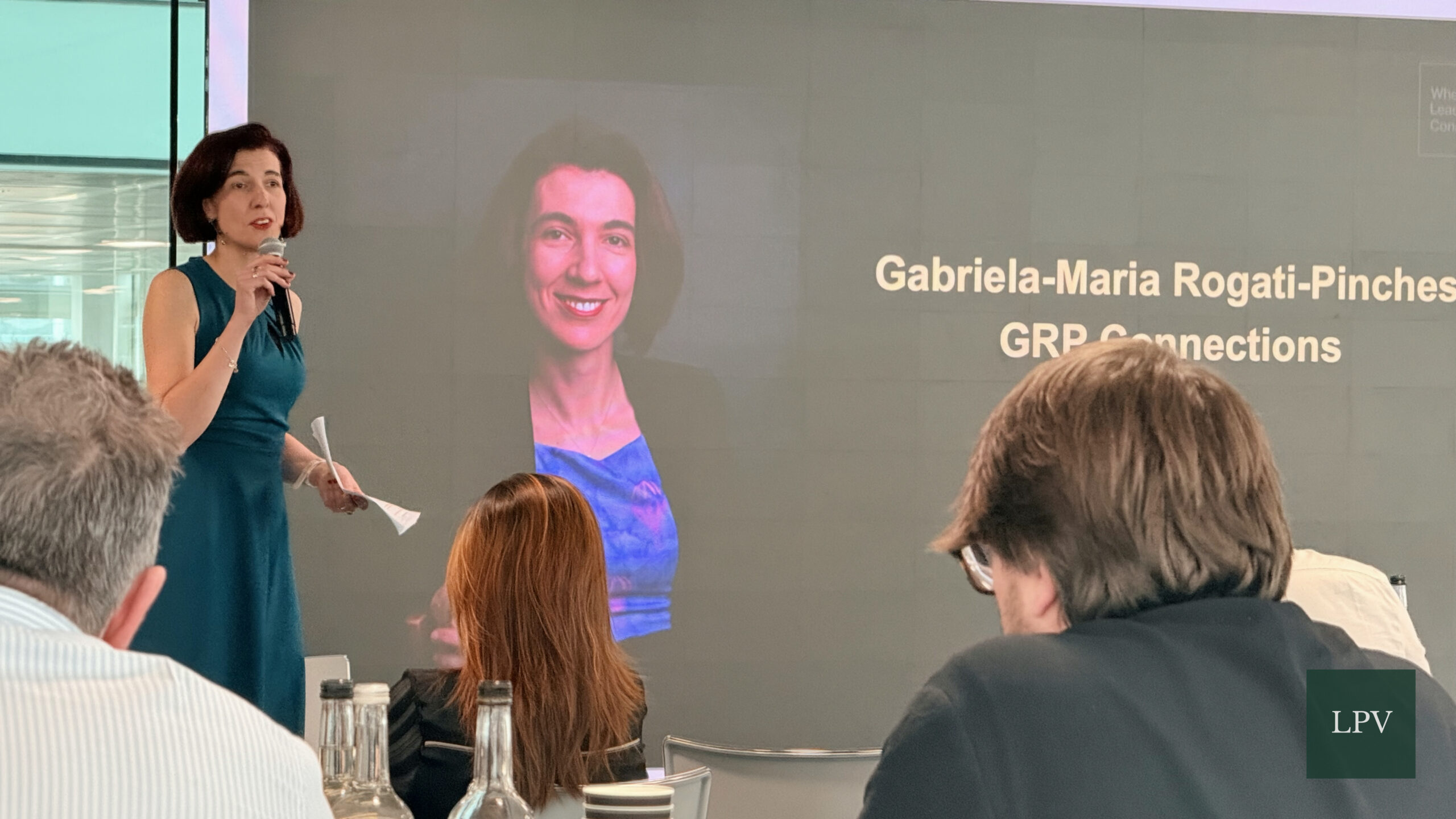 Gabriela-Maria Rogati-Pinches presenting on scalable partnerships at Corporate Connections Summit.