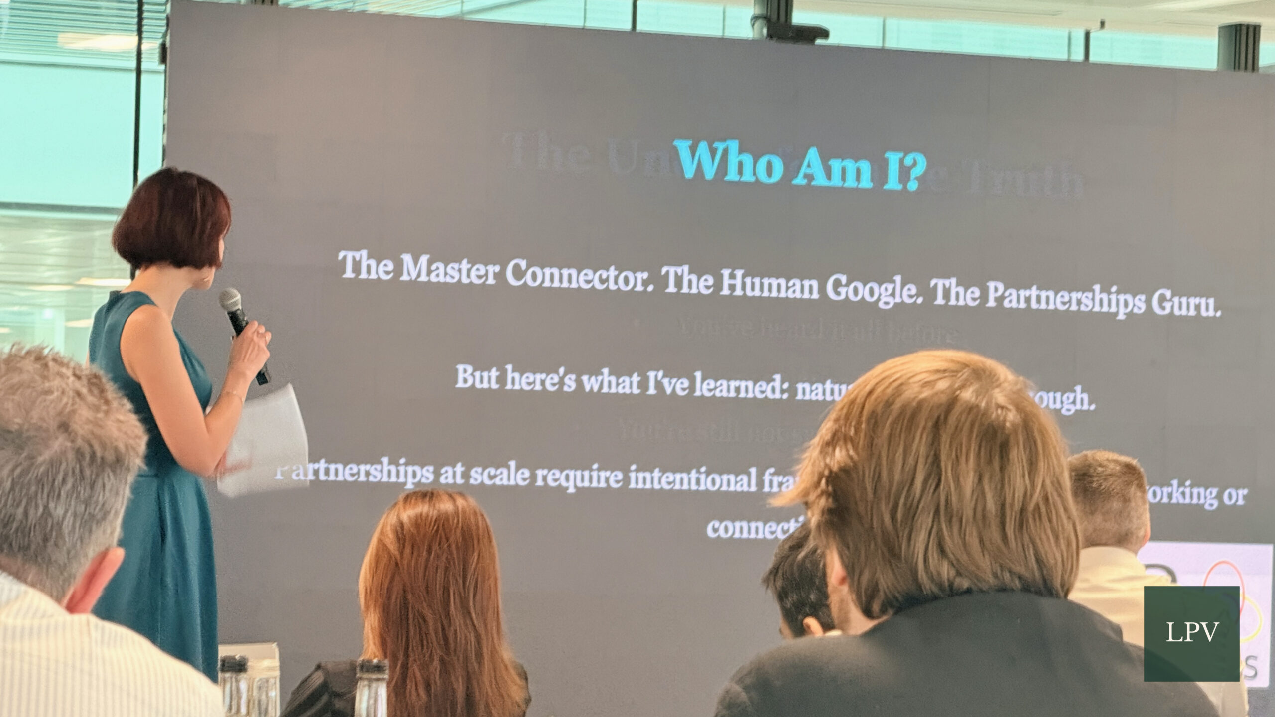 Gabriela-Maria Rogati-Pinches presenting on scalable partnerships at Corporate Connections Summit.