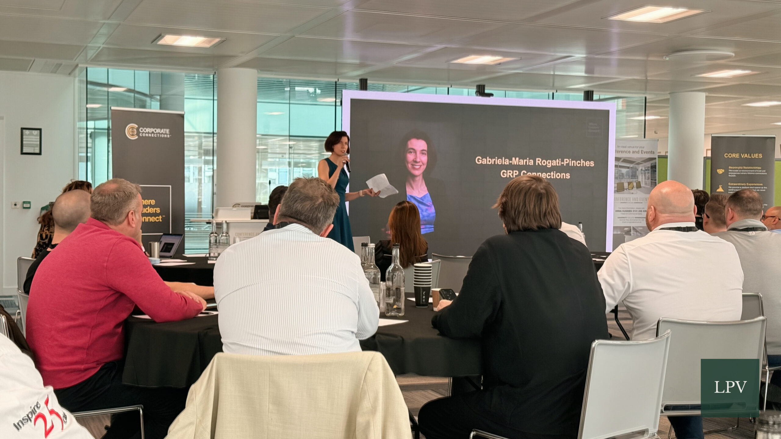 Gabriela-Maria Rogati-Pinches presenting on scalable partnerships at Corporate Connections Summit.