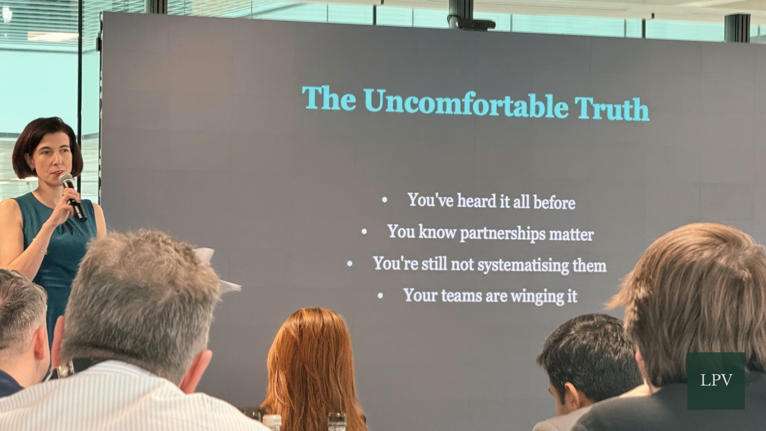 Gabriela-Maria Rogati-Pinches presenting on scalable partnerships at Corporate Connections Summit.