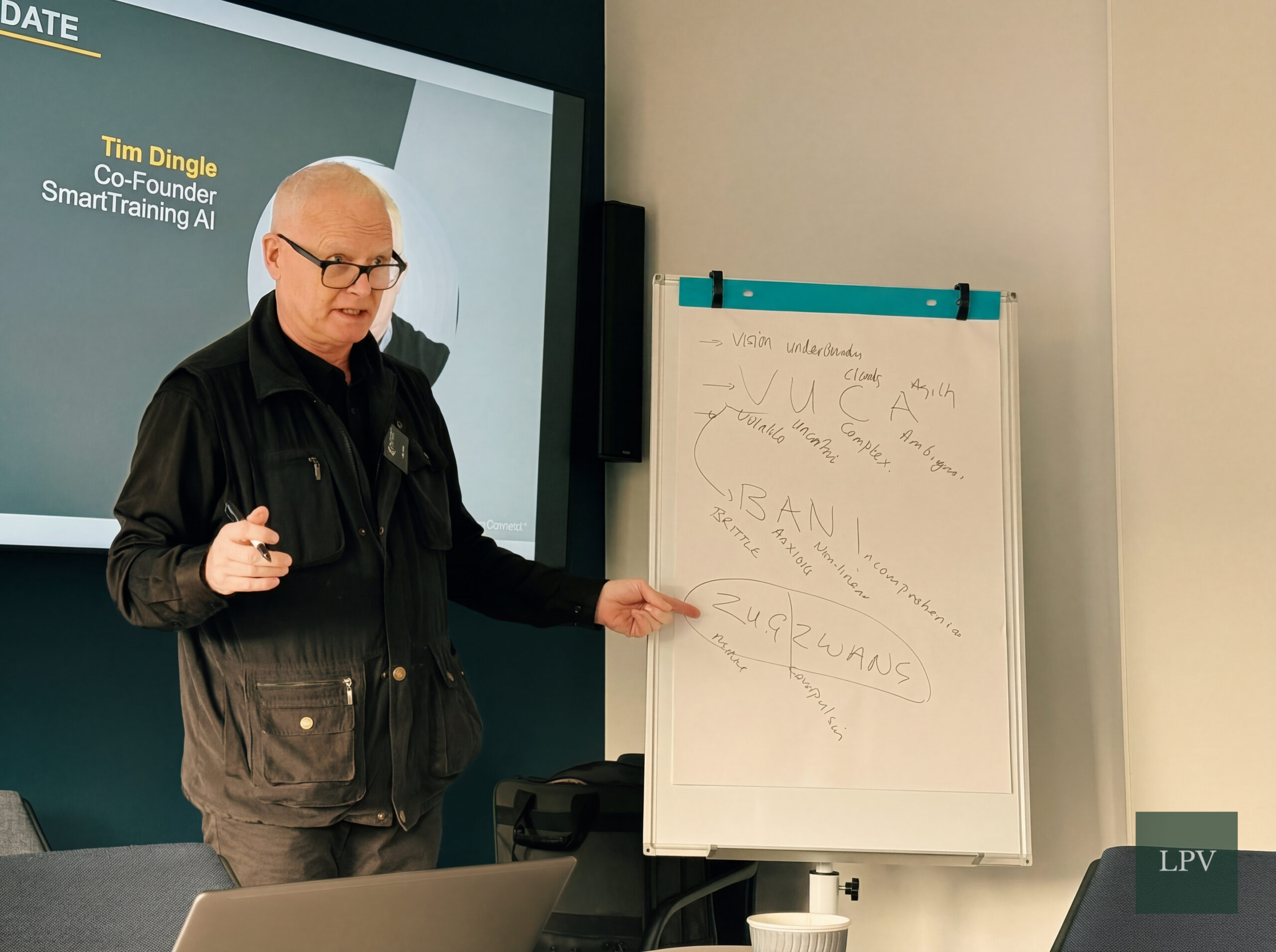 Industry leaders discussing VUCA and BANI insights at Corporate Connections London meeting.