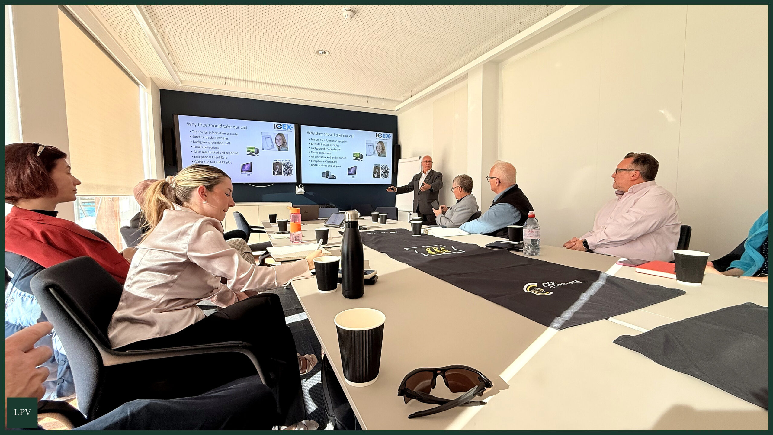 Corporate Connections meeting at Bayes Business School, showcasing professional collaboration and networking.