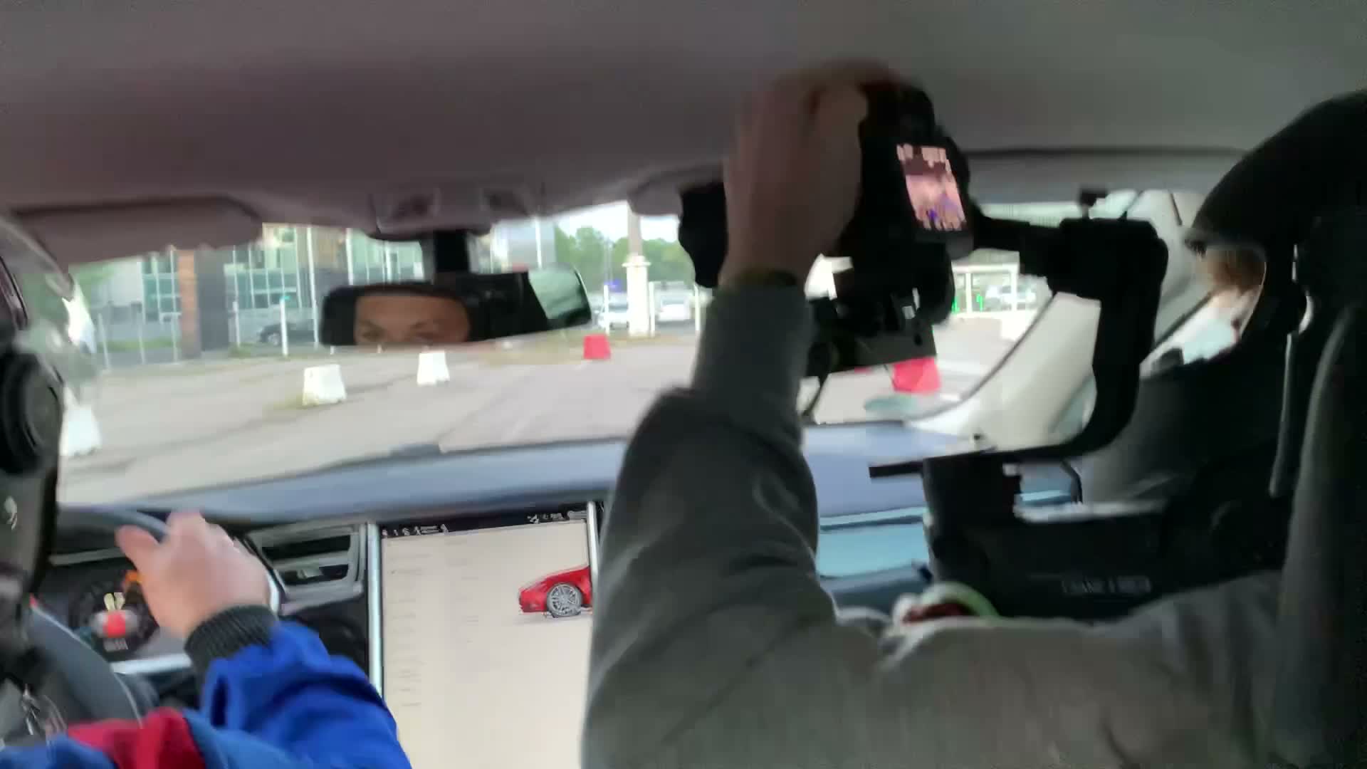 Filming a Tesla Track Run From the Back Seat: Why Steady Camera Work Is Harder Than It Looks: Why is filming inside the car more difficult than it looks? - done for you social media London