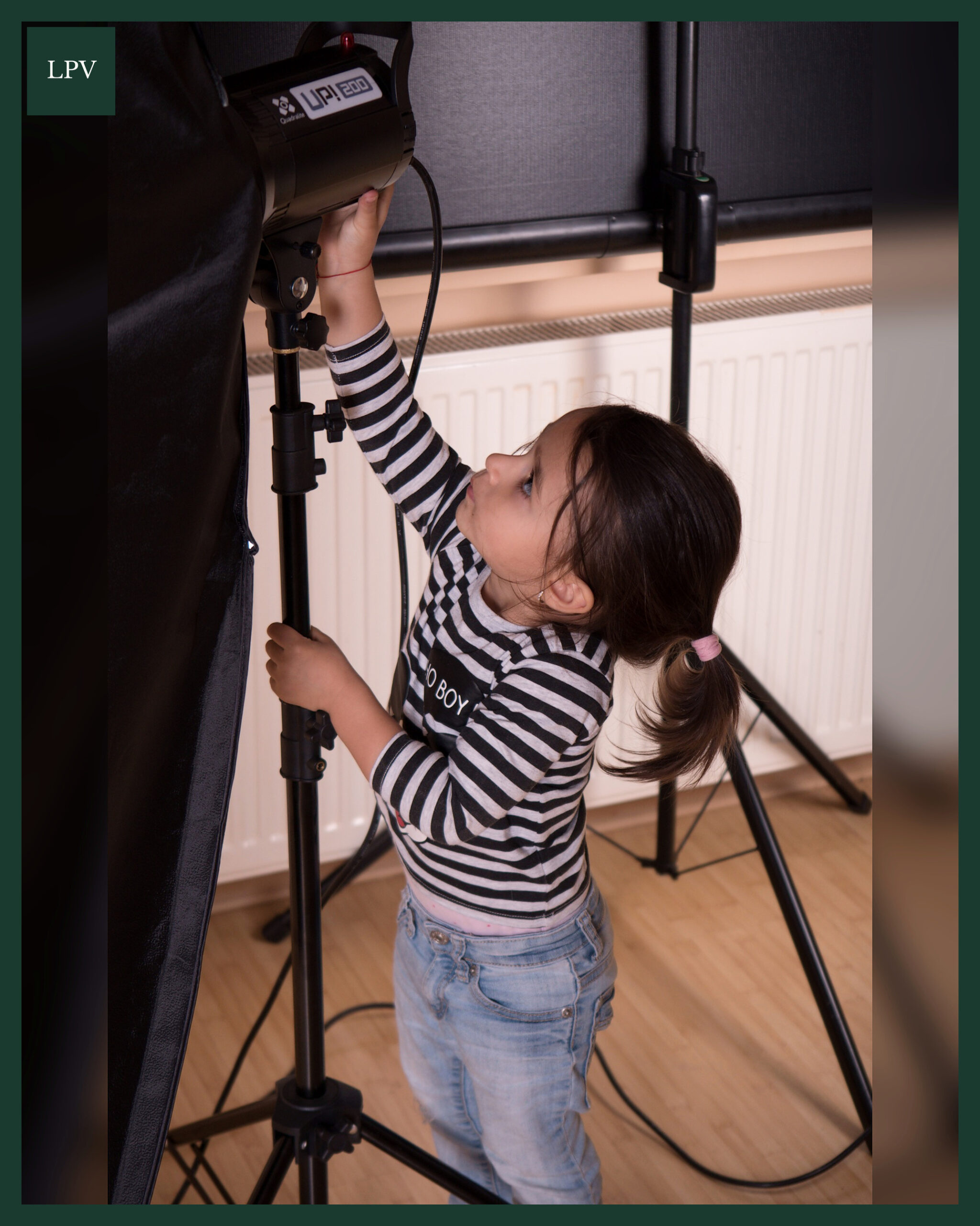 Softboxes, cables and black backdrop prepared in London studio before B2B video marketing shoot