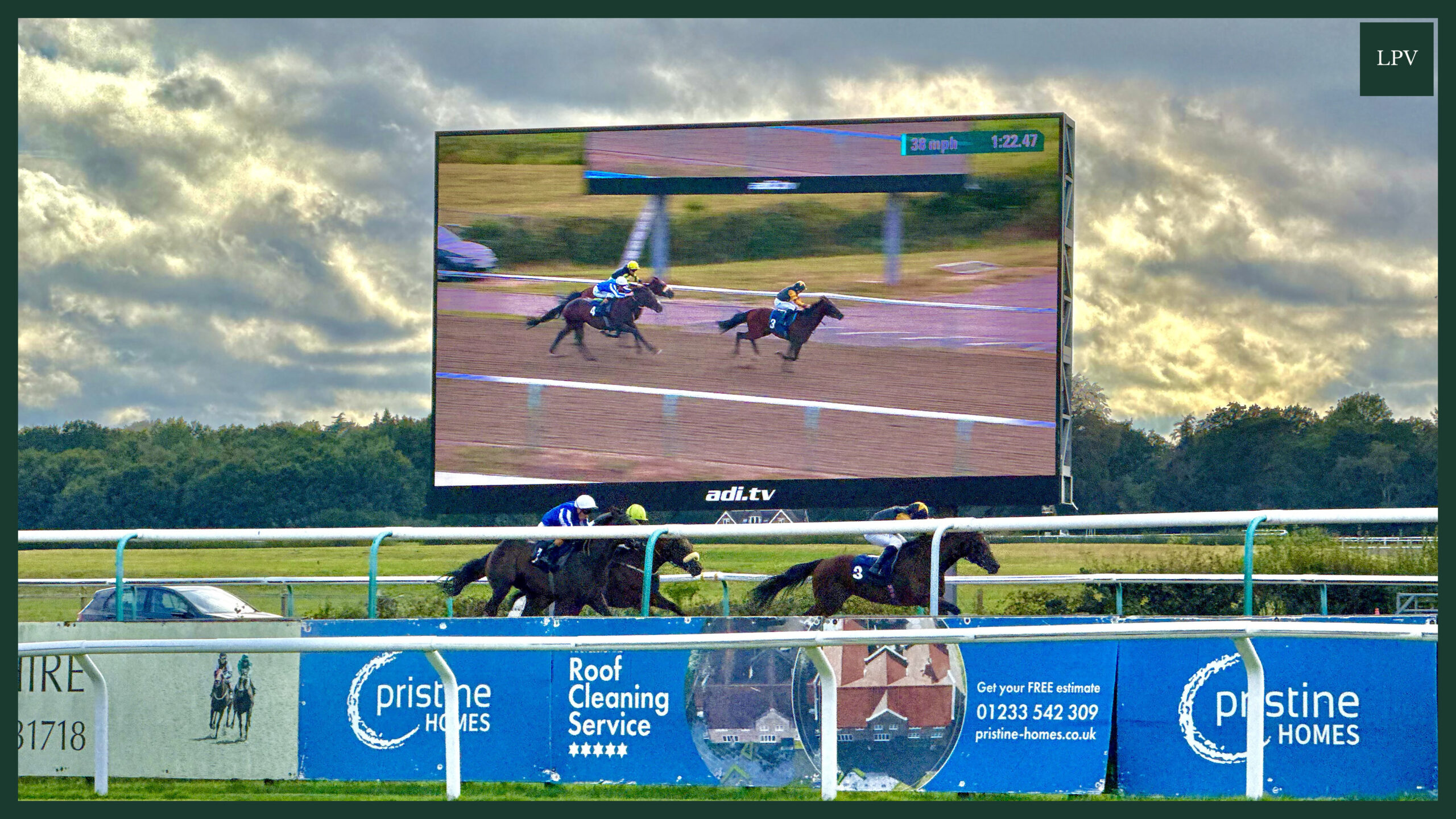 Male business owner builds B2B video marketing connections at Lingfield Park racing event near London