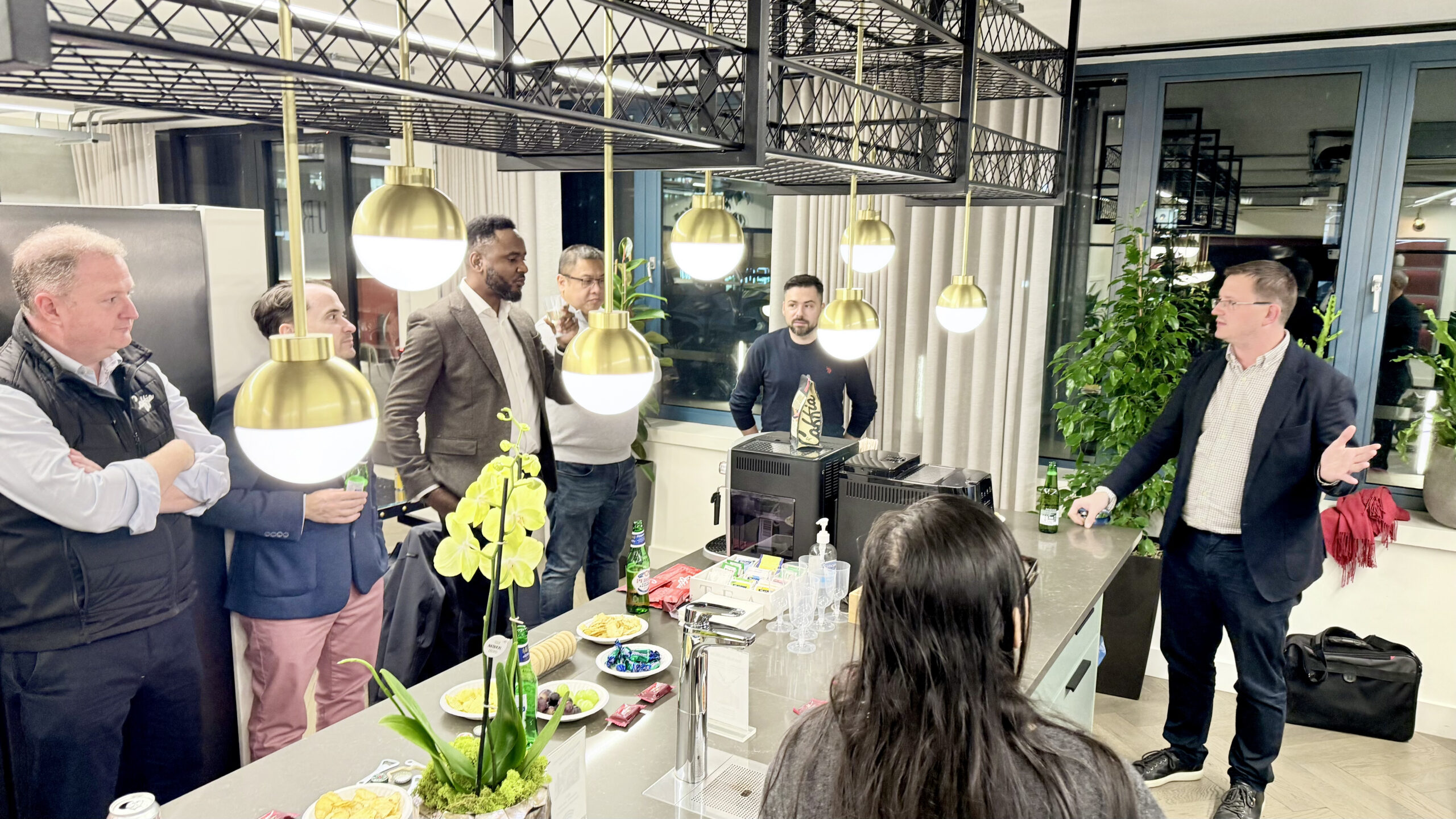 Attendees share genuine conversations and make professional connections at a London business mixer.